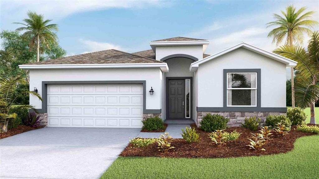 a front view of a house with a yard and garage