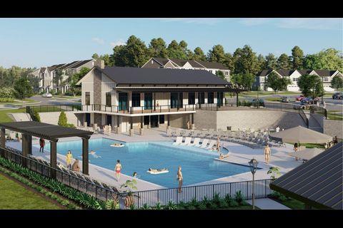 a view of a house with pool and chairs