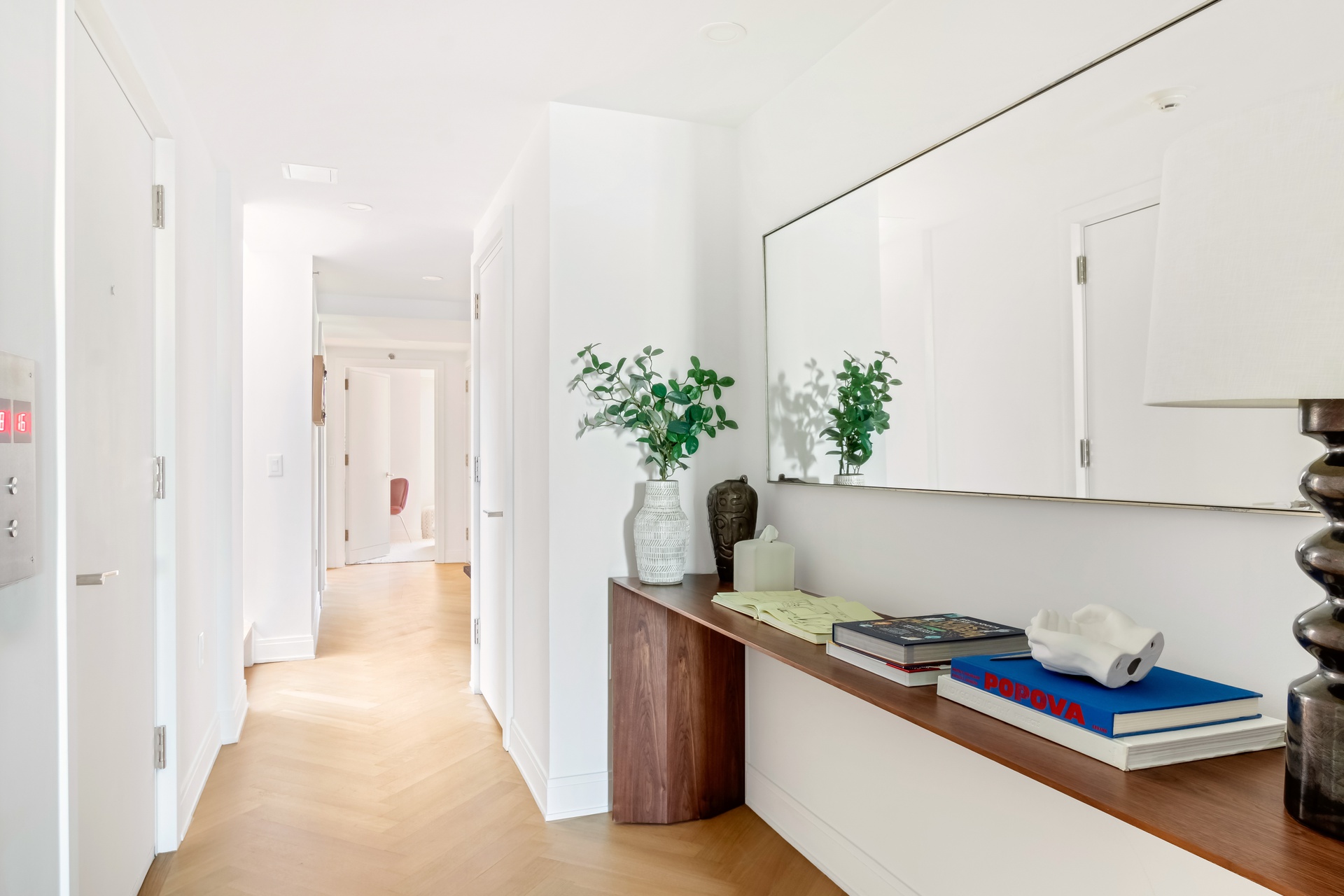 a kitchen with stainless steel appliances with cabinets