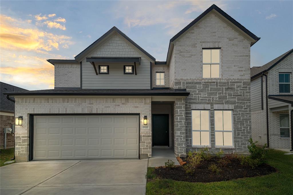 Welcome home to 1920 Scarlet Yaupon Way located in Barton Creek Ranch and zoned to Conroe ISD.