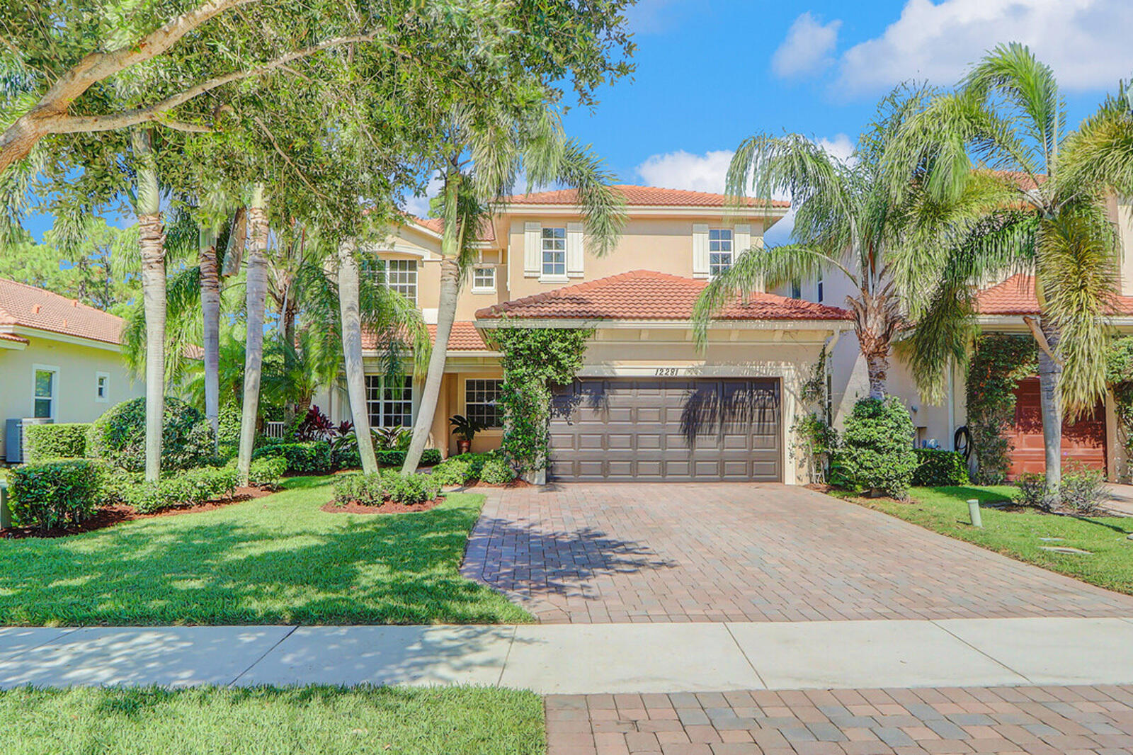 front view of a house with a yard