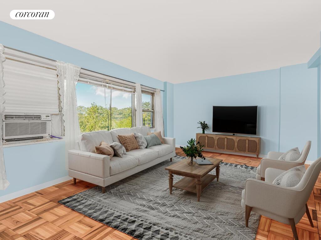 a living room with furniture and a flat screen tv