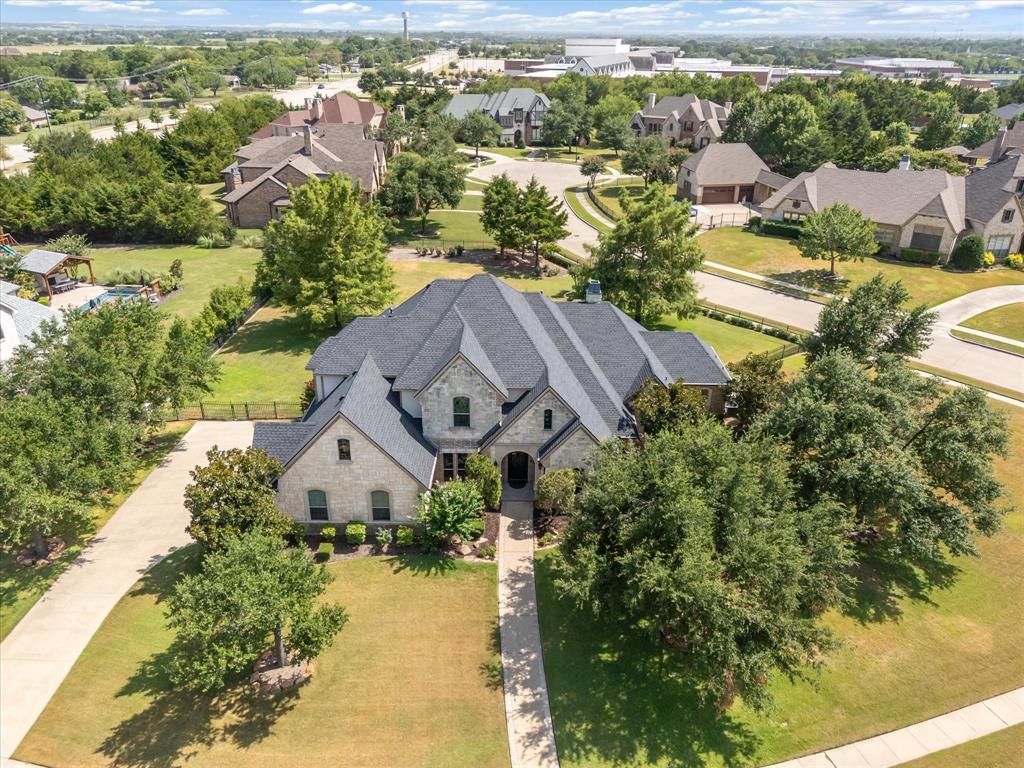 an aerial view of a house with a garden