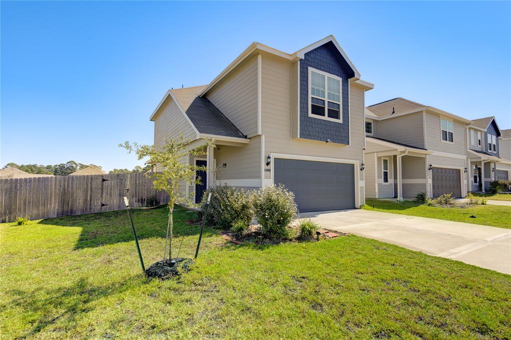 a house that has a big yard in front of it