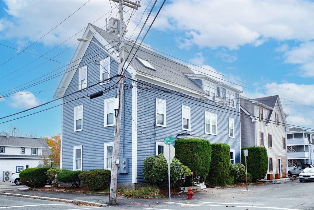 a view of a building with a street