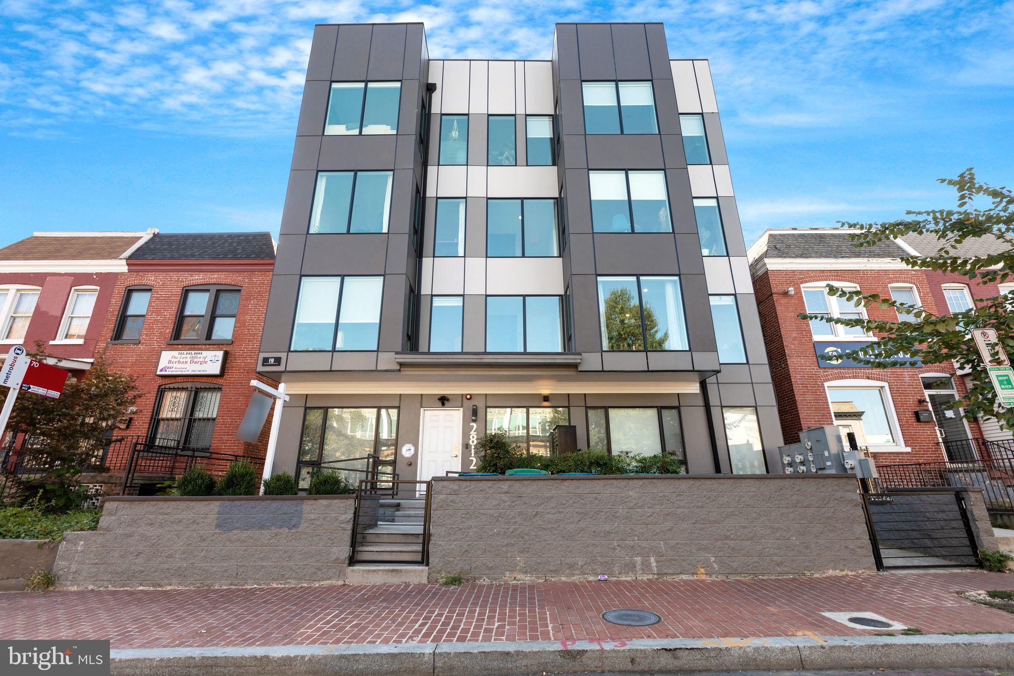 a front view of a multi story residential apartment building