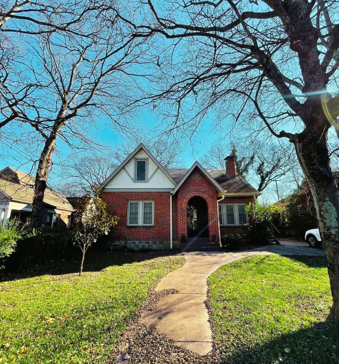 a front view of a house with garden