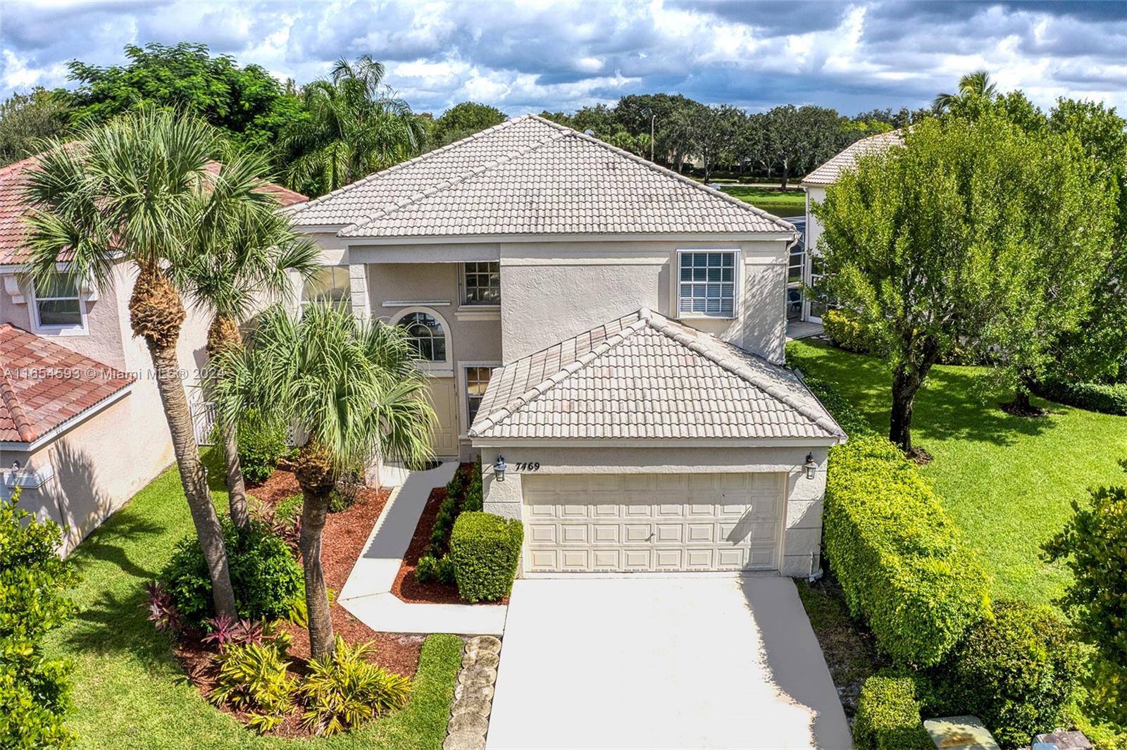 front view of a house with a yard