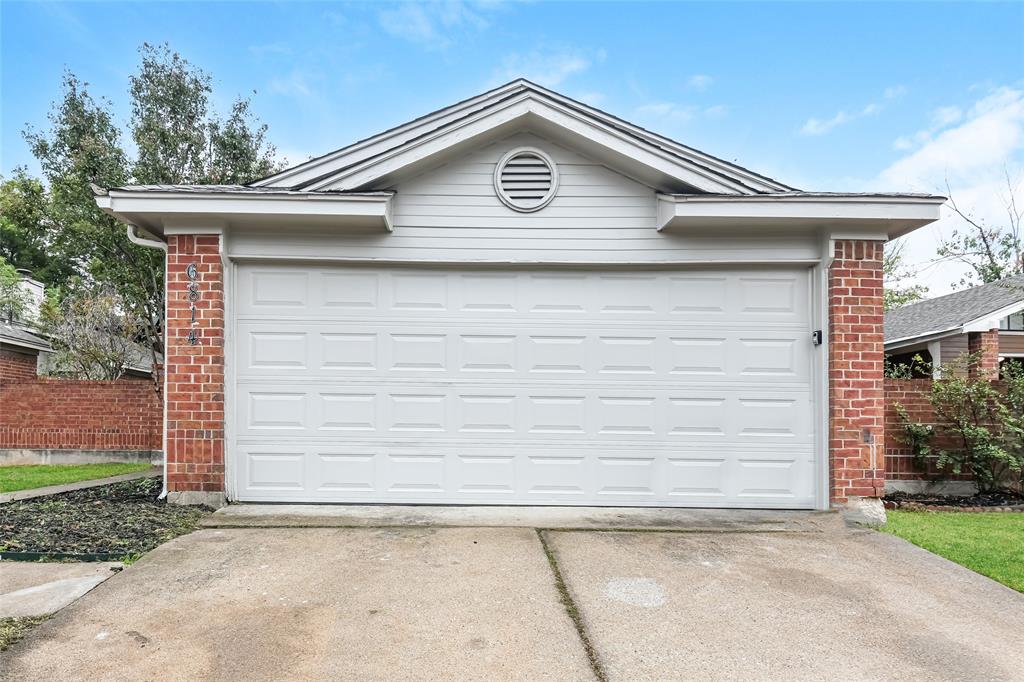 a small white building with a outdoor space