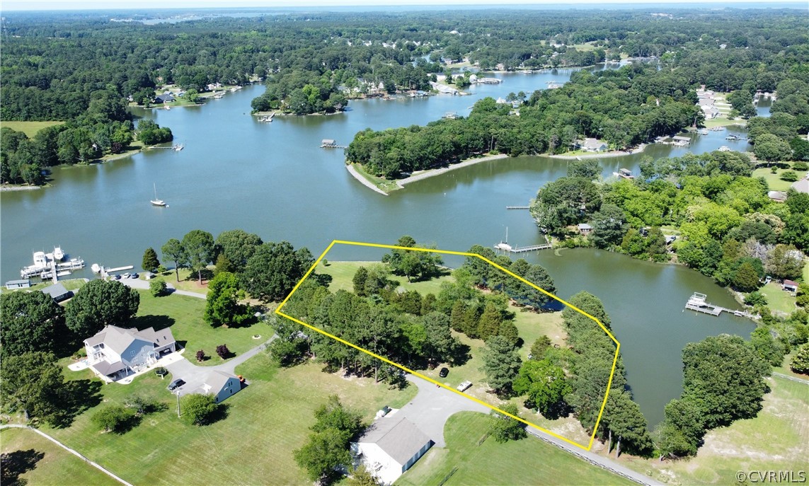 an aerial view of lake residential house with outdoor space