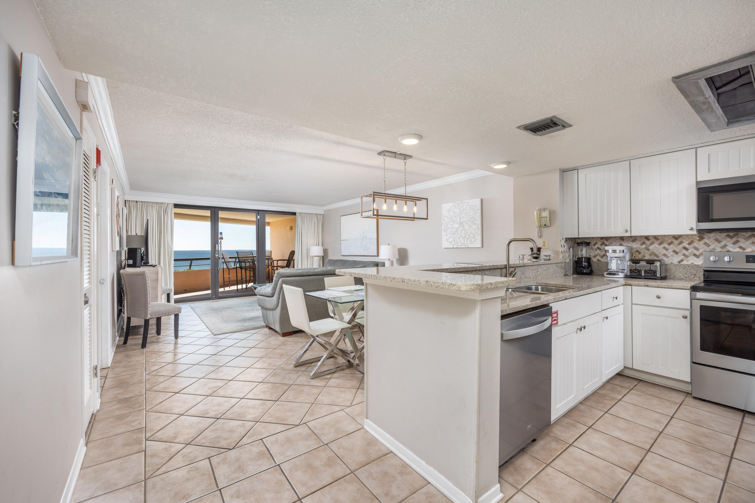 a kitchen with counter top space and appliances