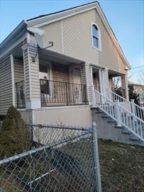 a front view of a house with windows