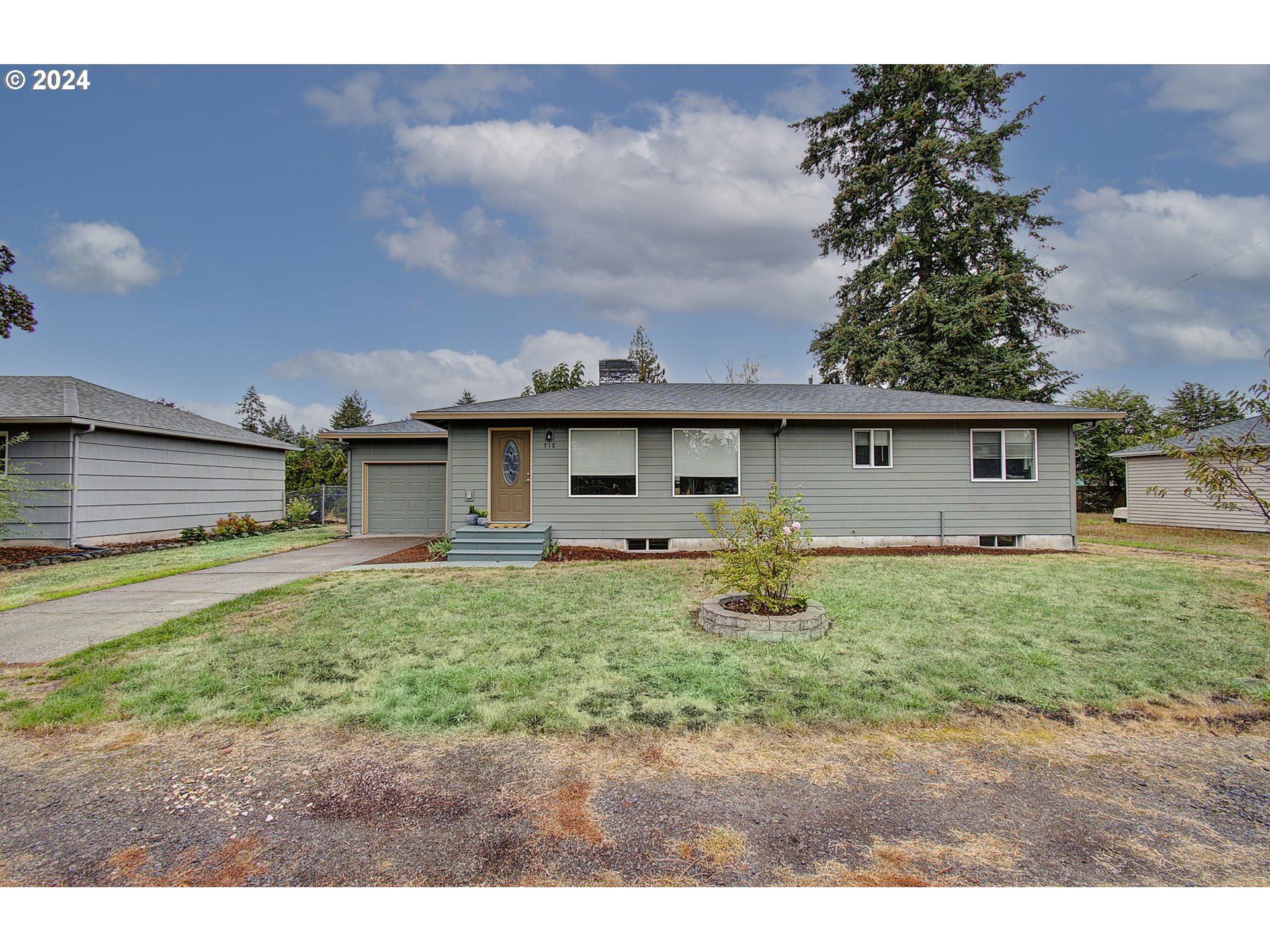 a house view with a backyard space