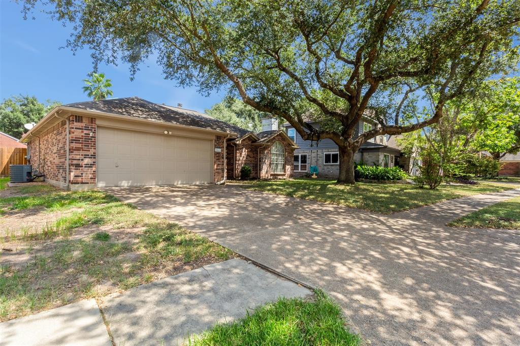 NEW ROOF! Welcome home! 1 Story home with 3 bedrooms 2 full baths and large backyard with covered patio!