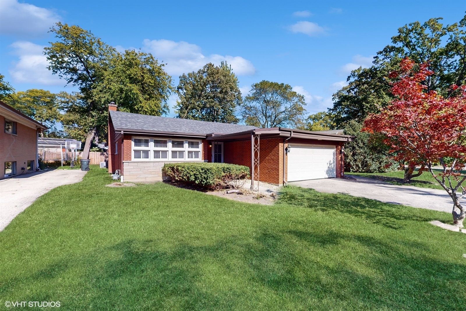 front view of a house with a yard