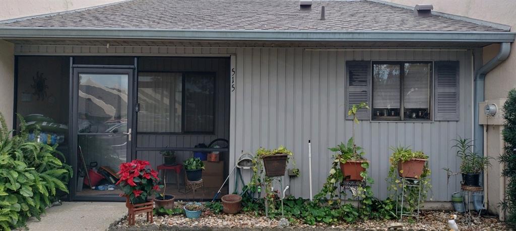 a front view of a house with an outdoor space