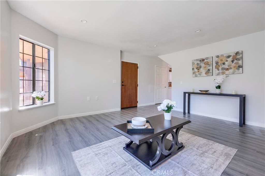 a living room with furniture and window