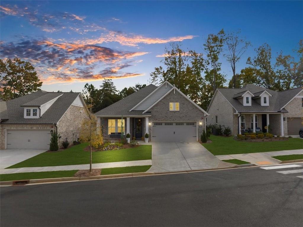 front view of a house with a yard