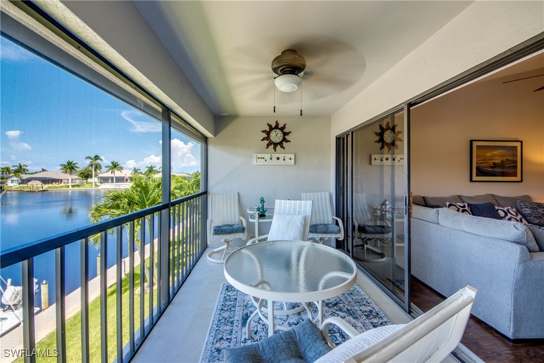 a view of a living room and a balcony