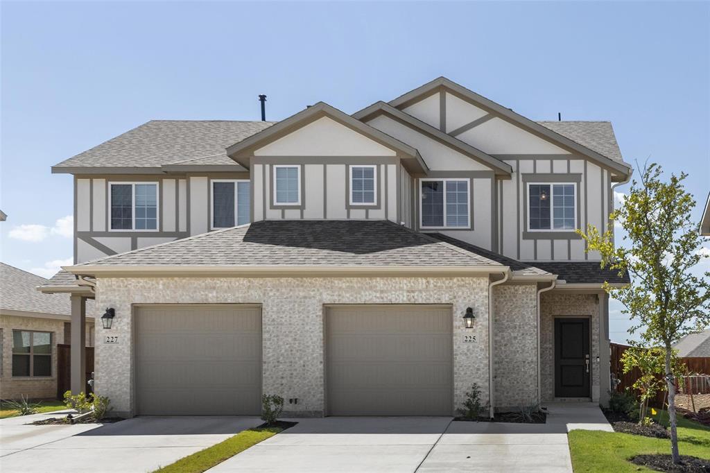 a front view of a house with yard