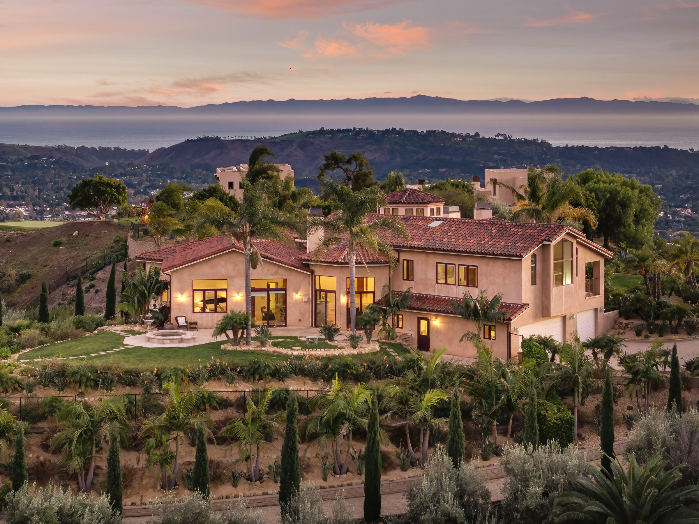 an aerial view of residential houses and outdoor space