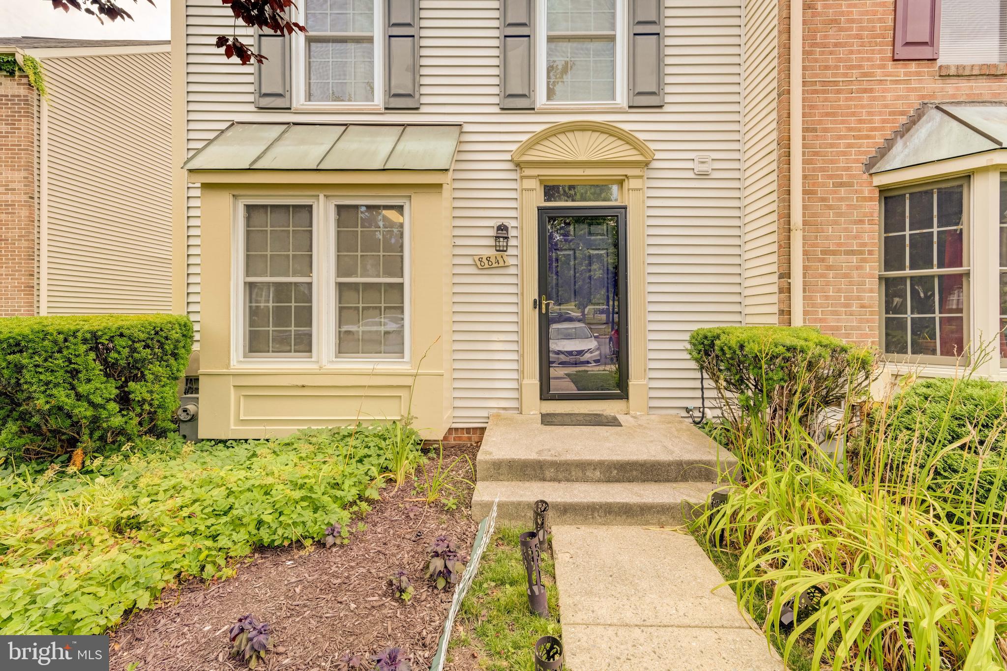 a front view of a house having yard