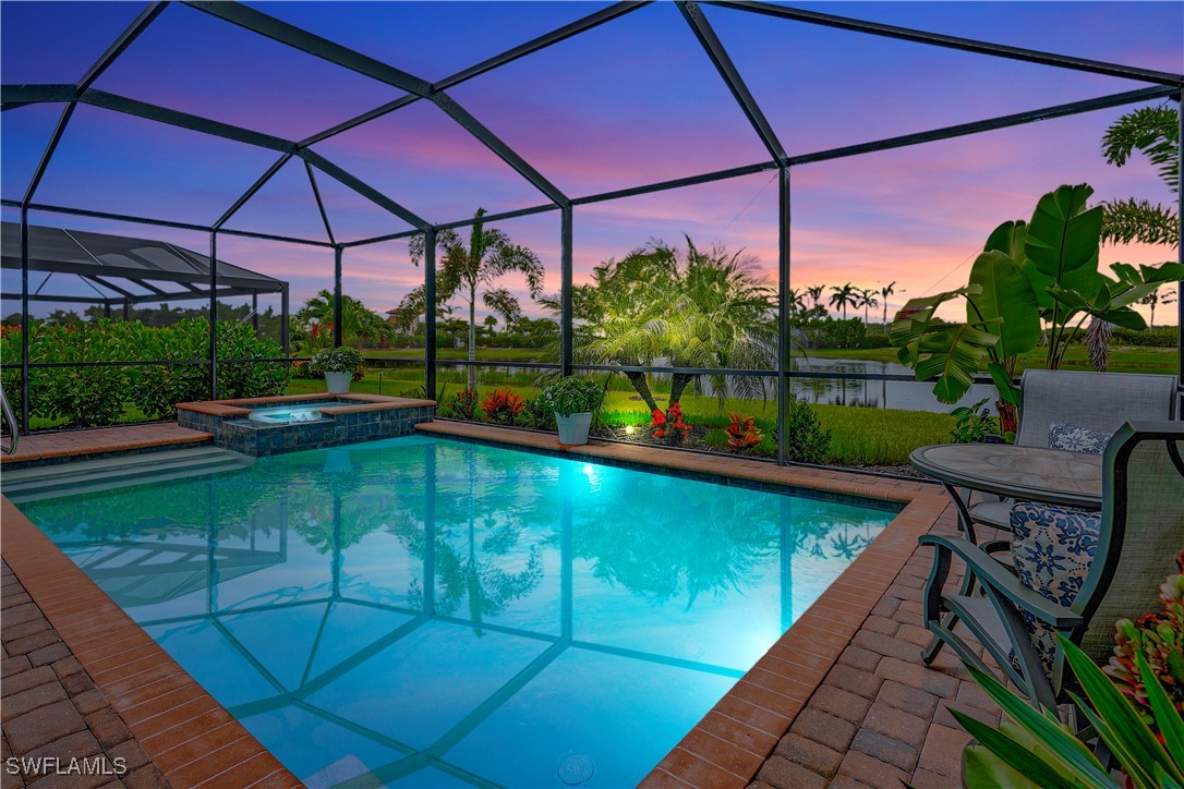 a view of a swimming pool with a patio