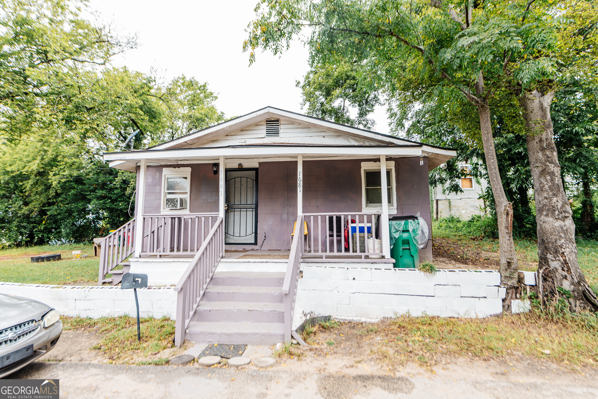 a front view of a house with a porch