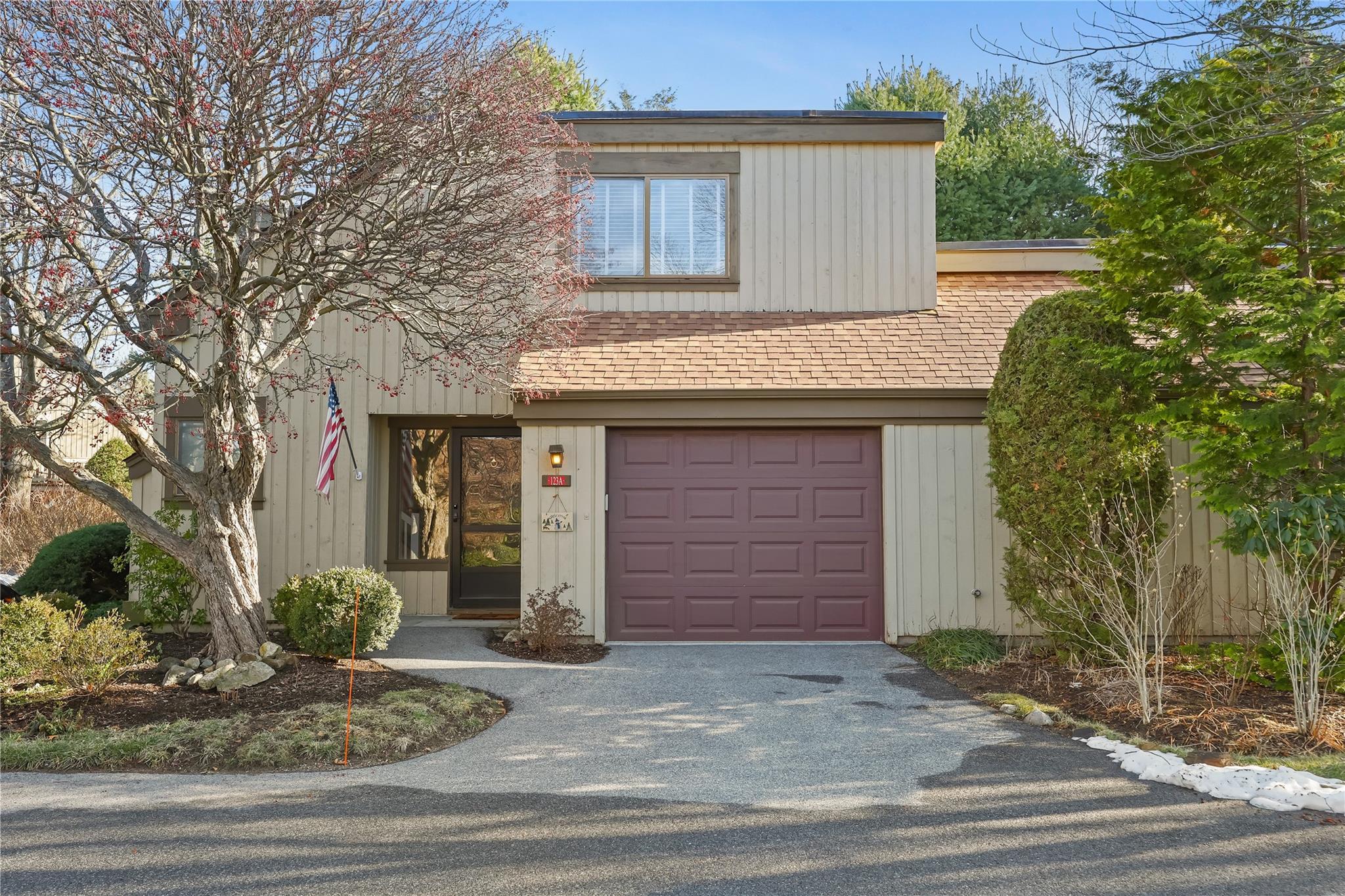 Front of property featuring a garage