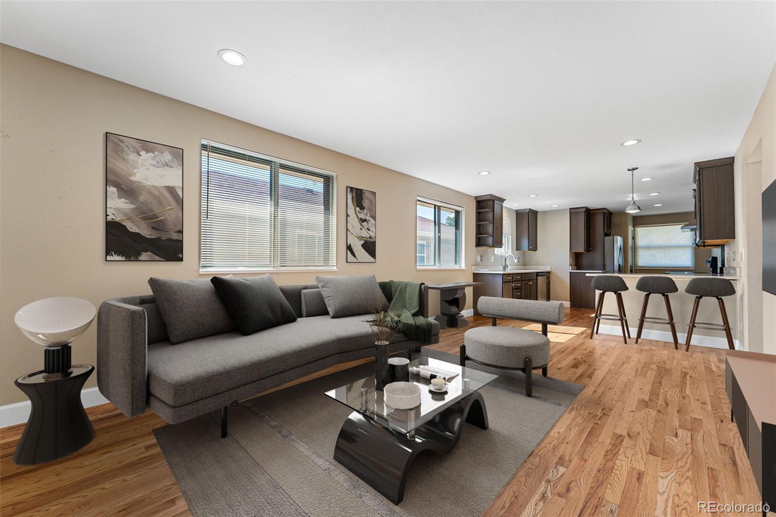 a living room with furniture and a table