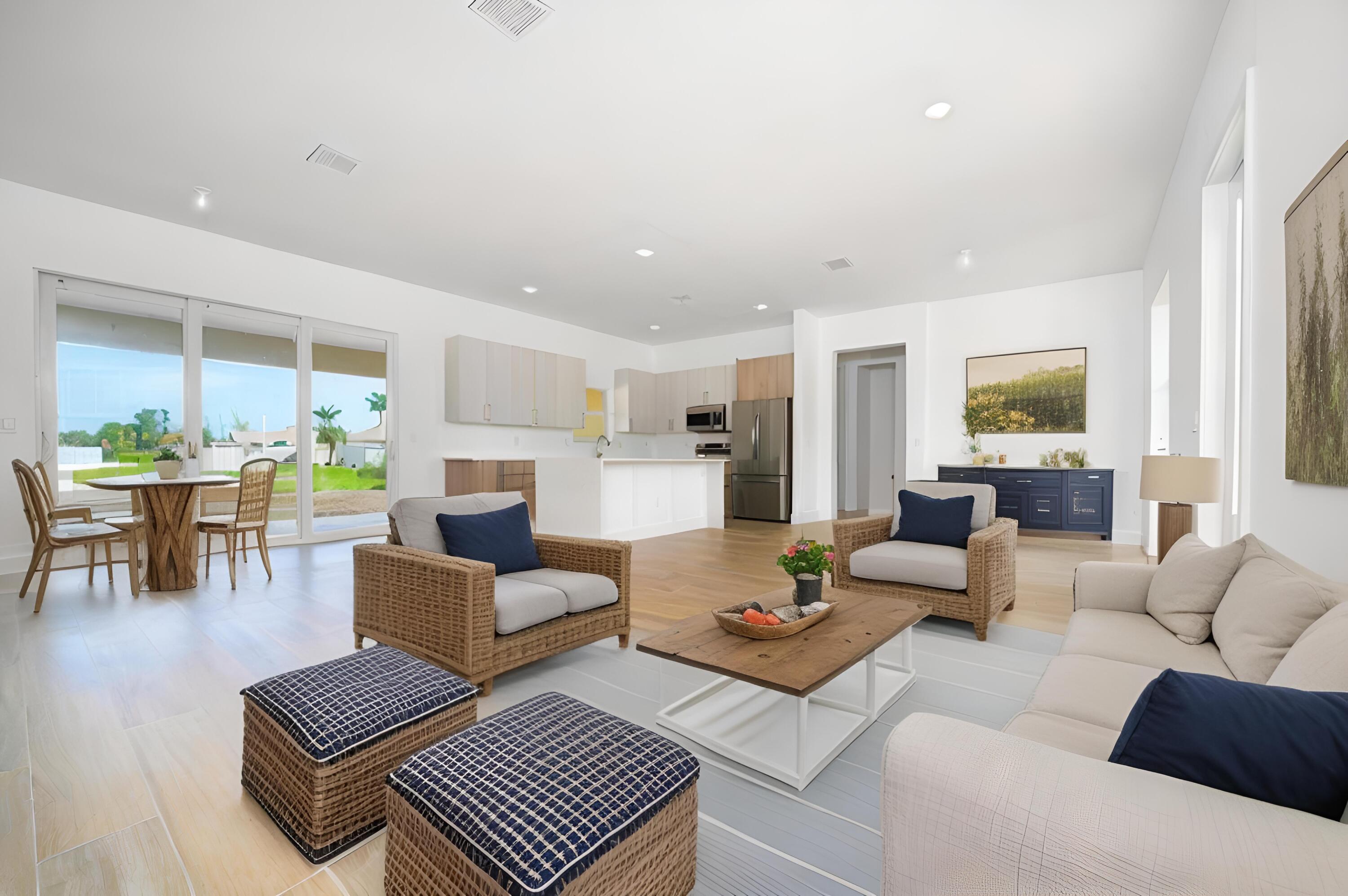 a living room with furniture rug and window