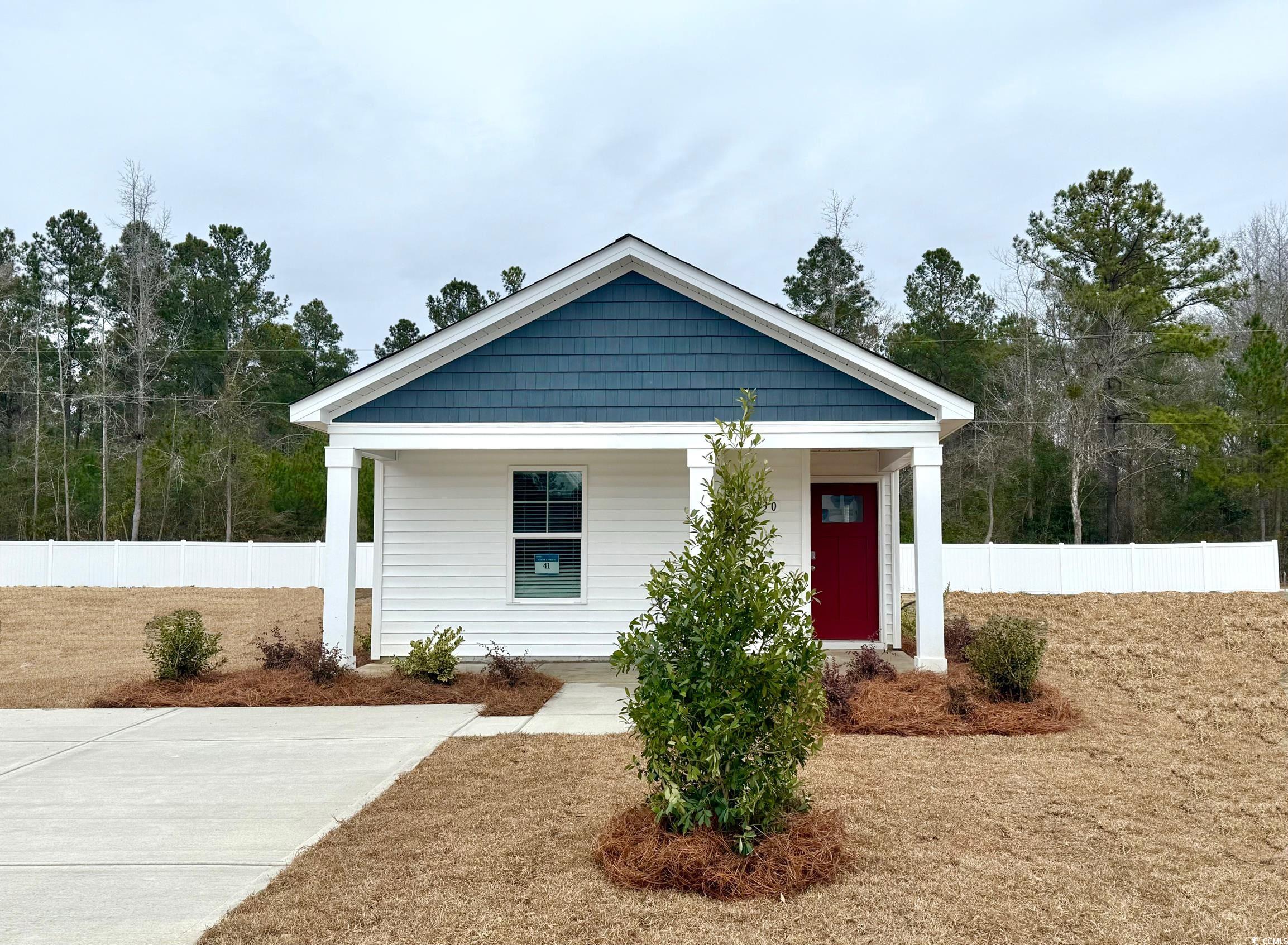 View of front of property featuring a porch