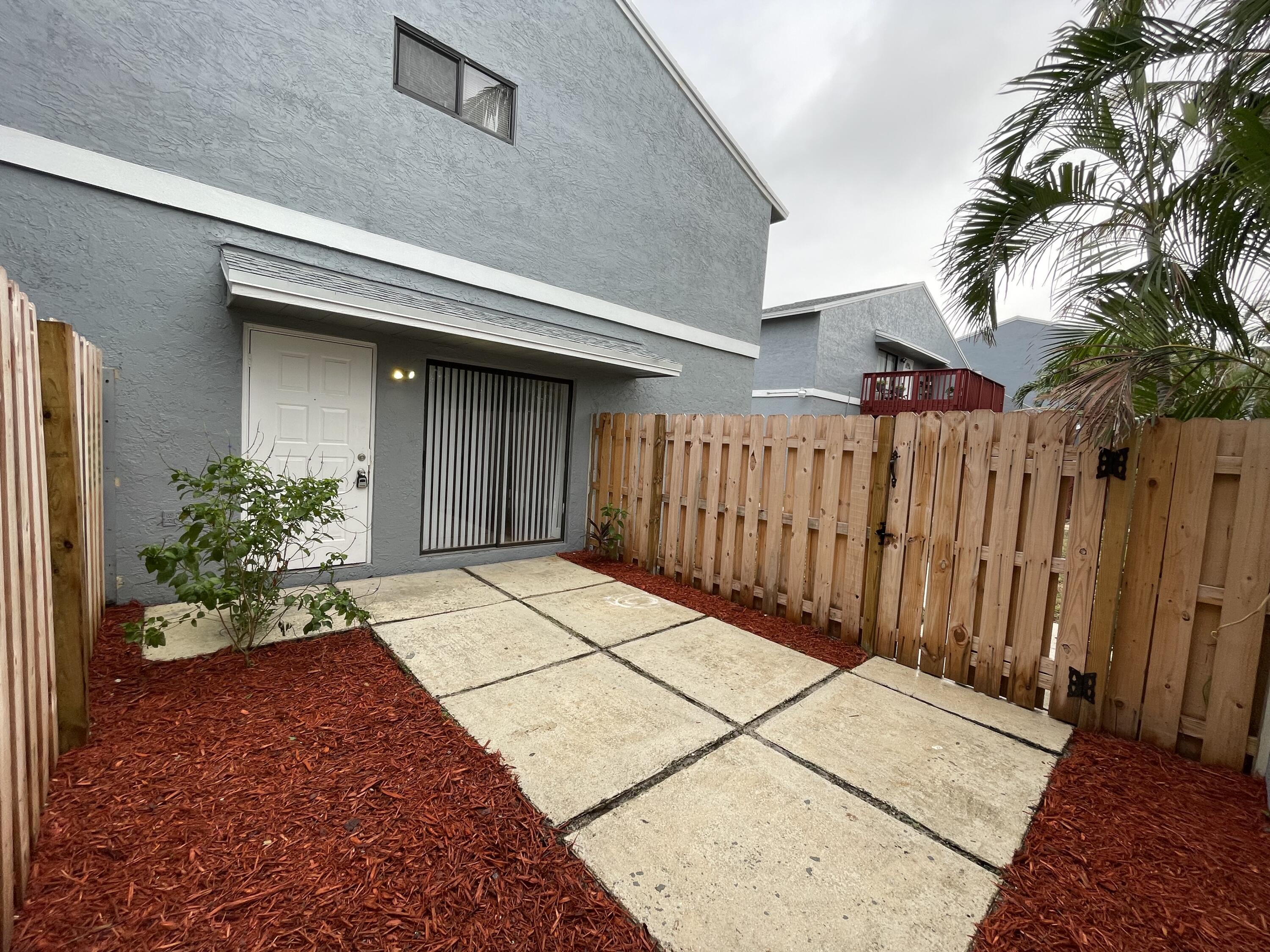 a entryway view with a garden