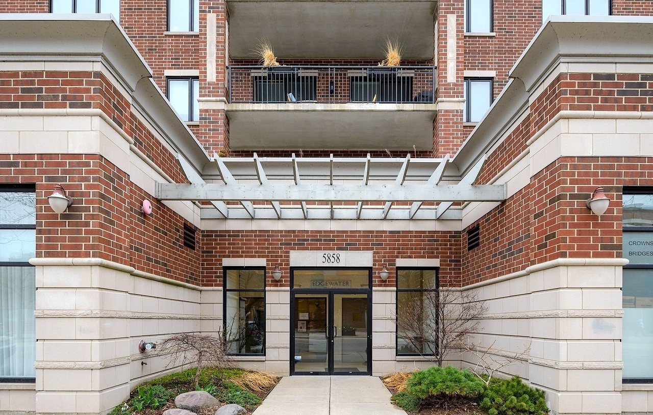 a view of a building with a door and a outdoor space