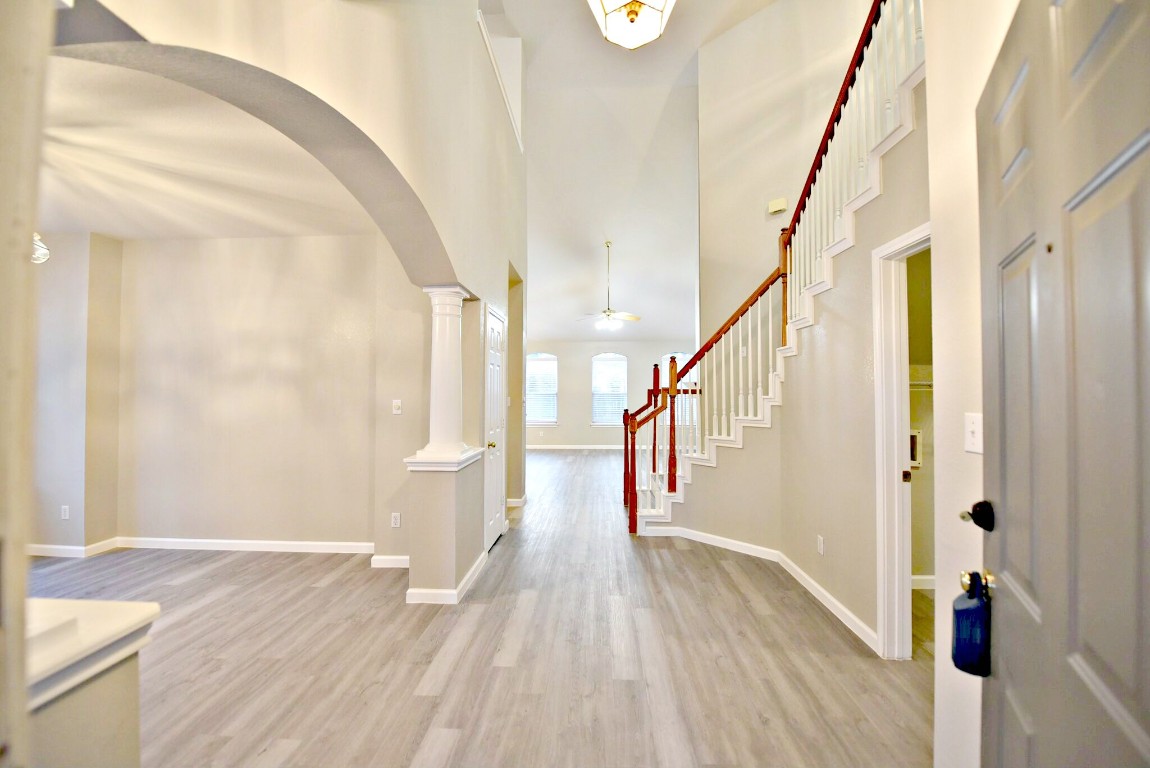 a view of entryway with wooden floor