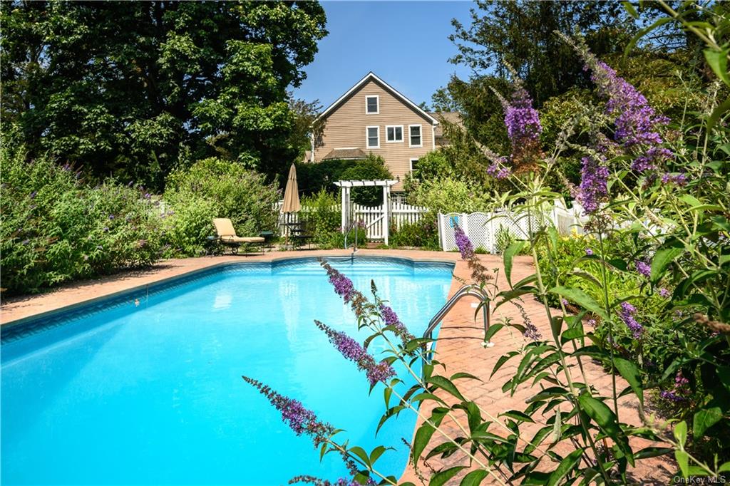 a view of a house with swimming pool