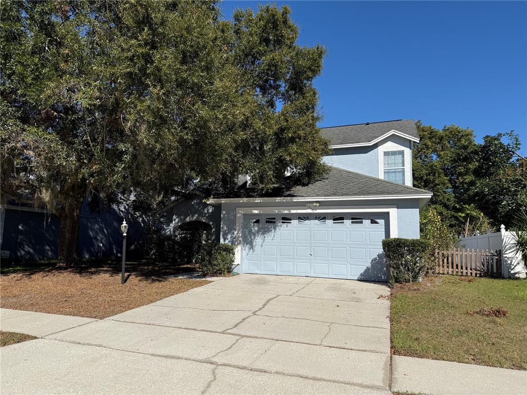 front view of house with a yard