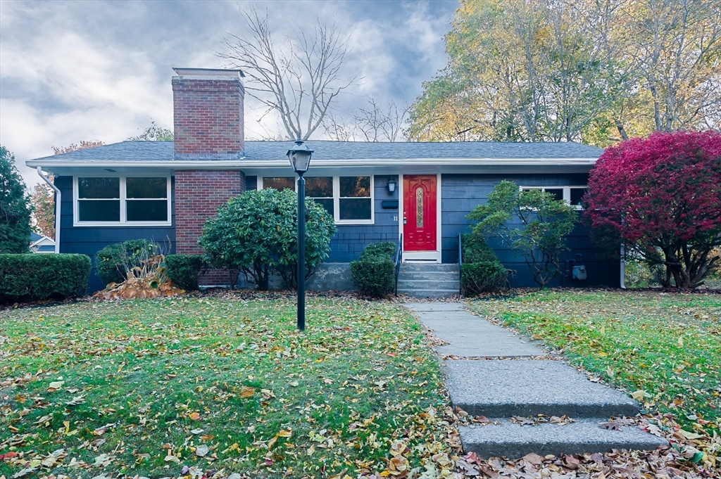 front view of a house with a yard