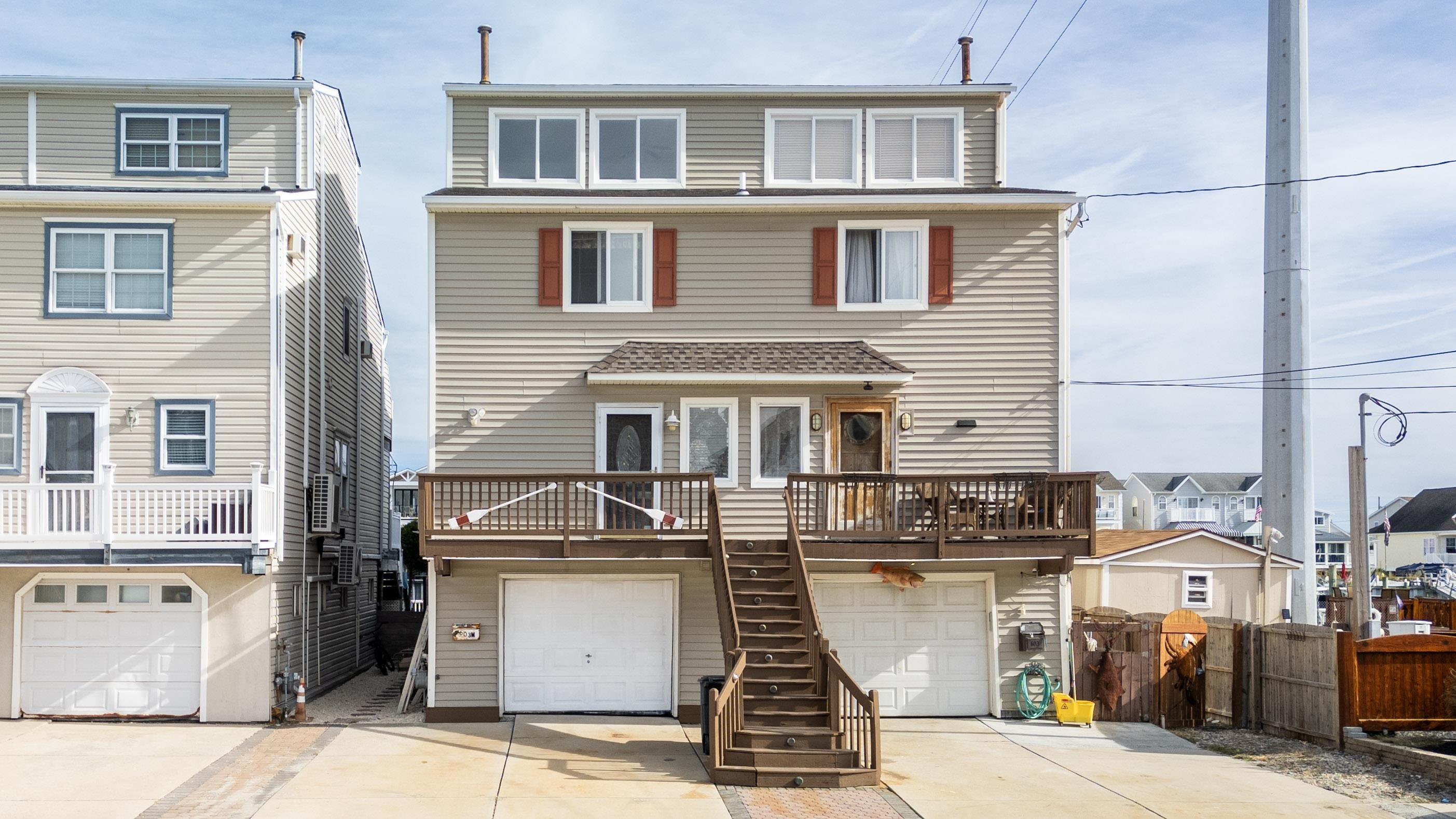 a front view of a house with a balcony