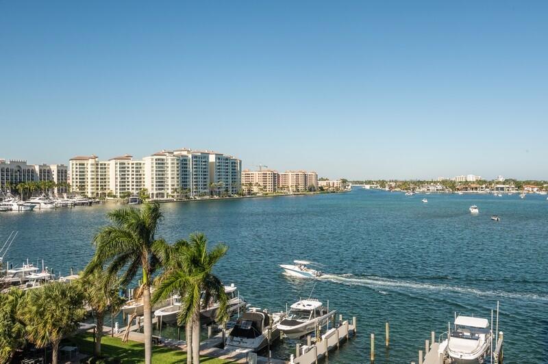 a view of lake with a city