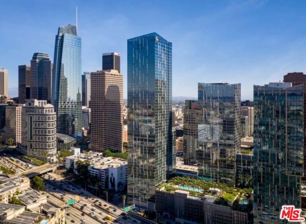 a view of city with tall buildings