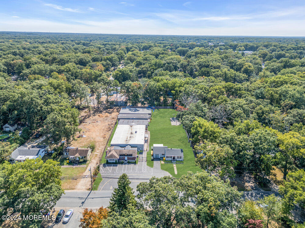 an aerial view of a house with a garden