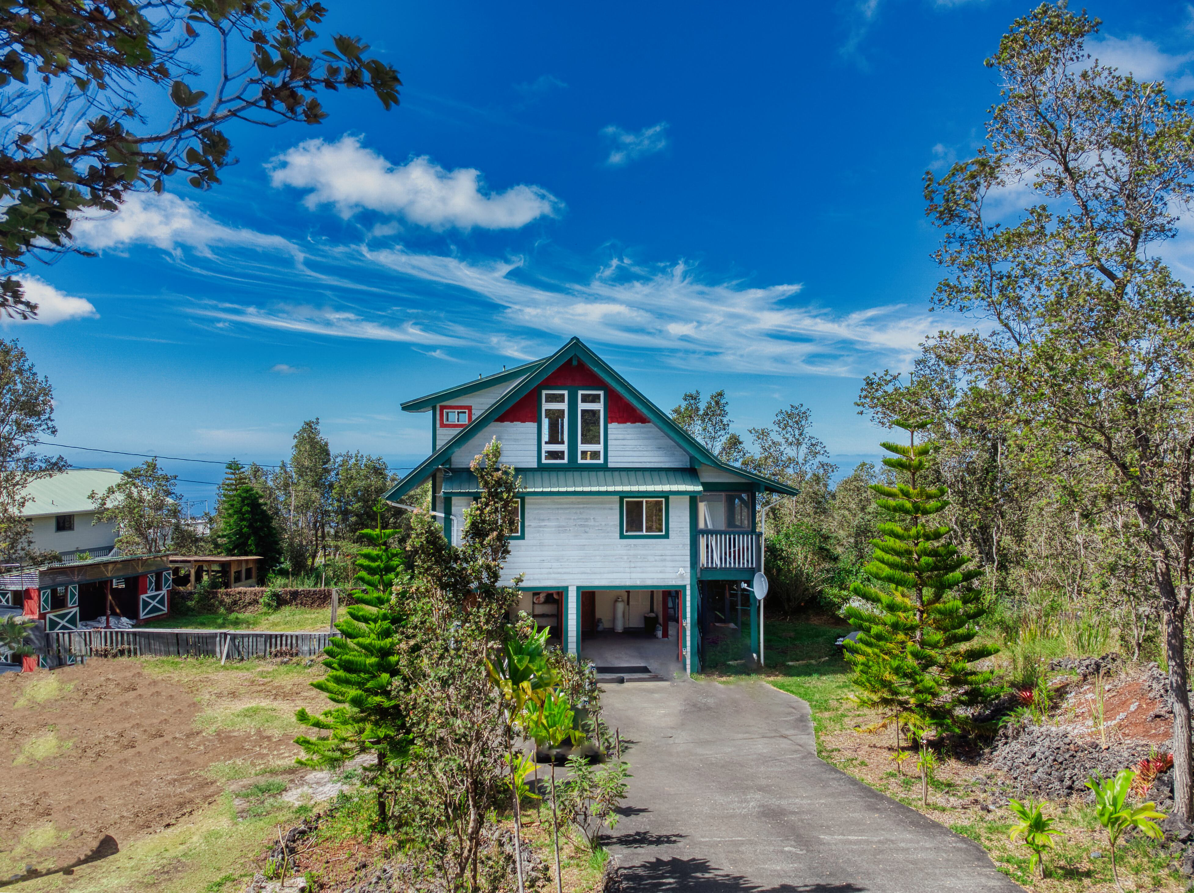 a house with trees in the background