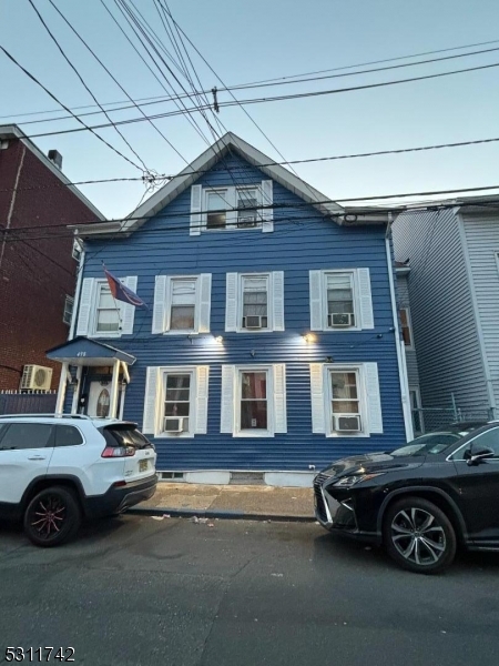 a car parked in front of a house