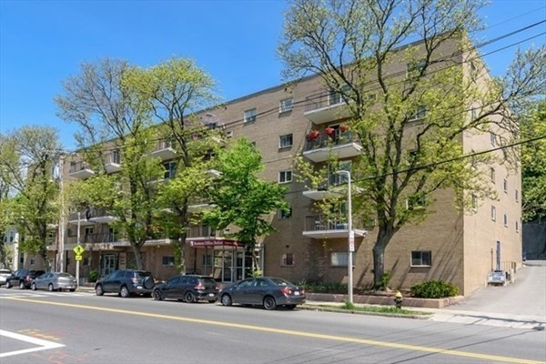 front view of a building with a street