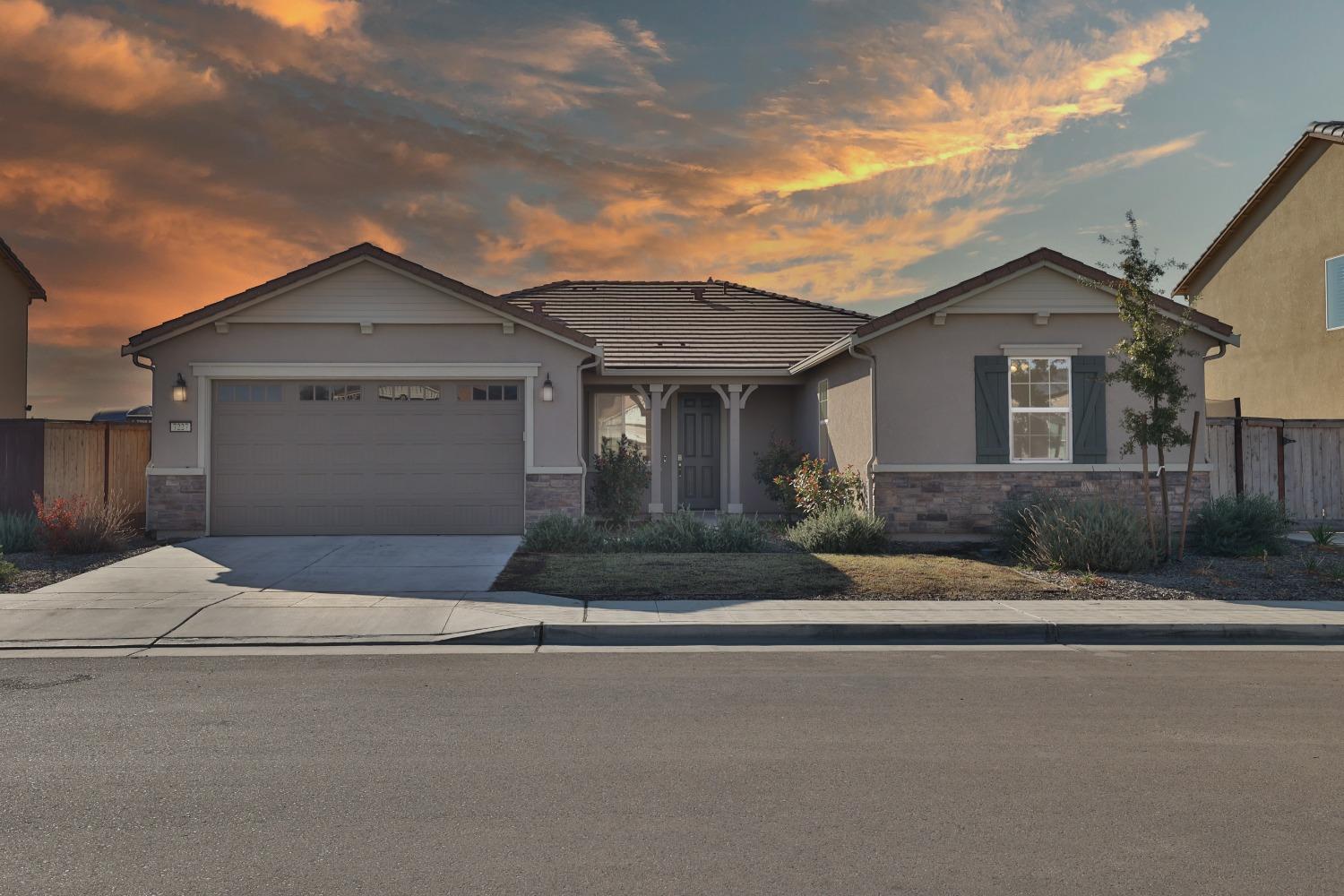 front view of a house with a street