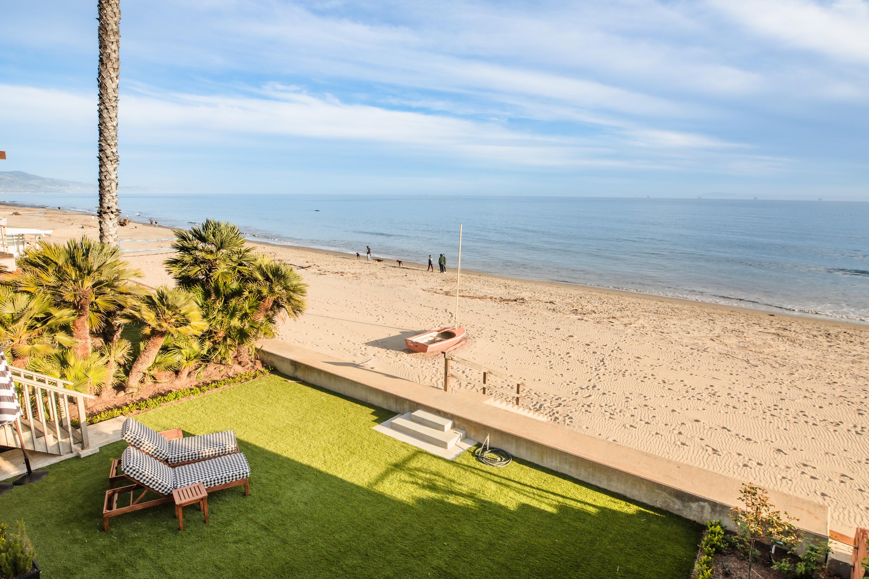 a view of a swimming pool with a lounge chairs