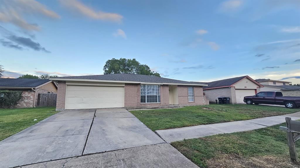 front view of house with a yard