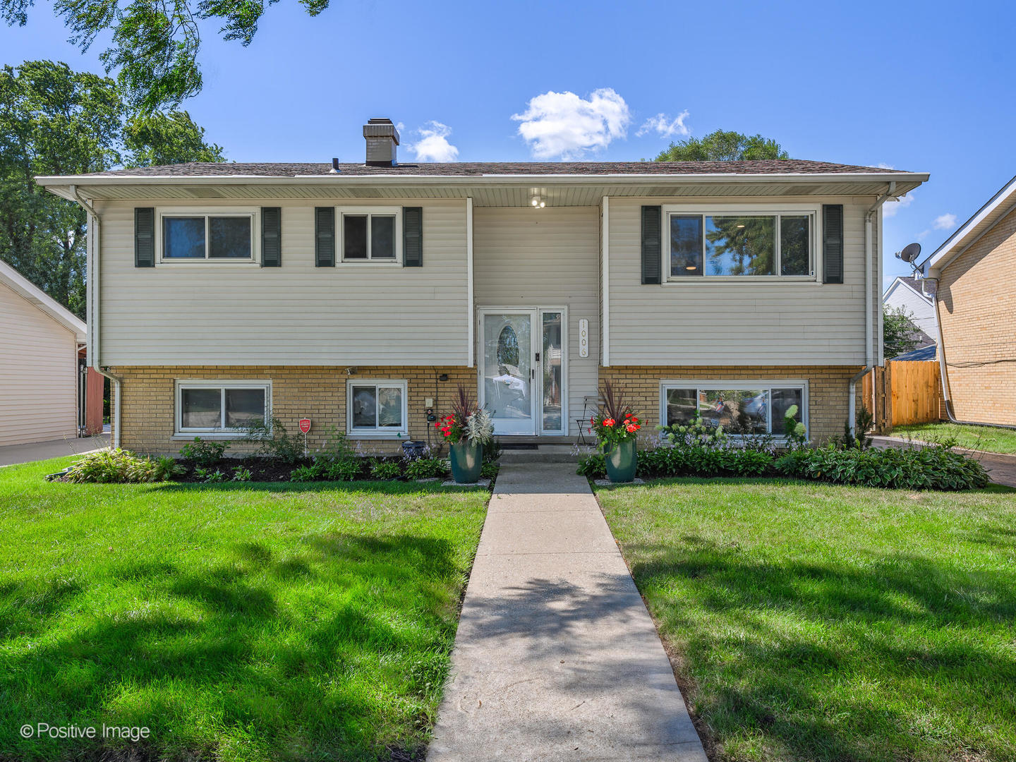 a front view of house with yard