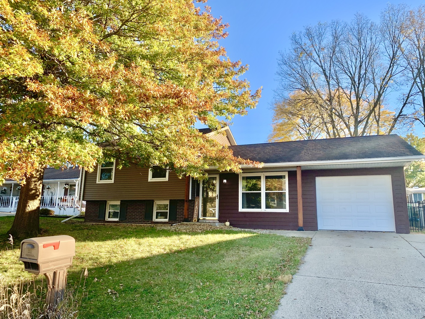 front view of a house with a yard